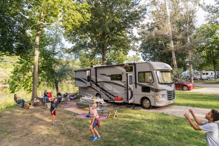 a Class A motorhome set up for camping