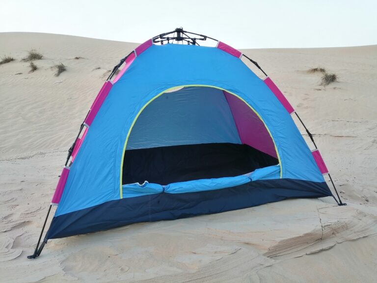 A pop up tent set up at the beach