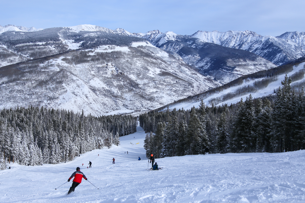 Skiers headed down Vail Mountain