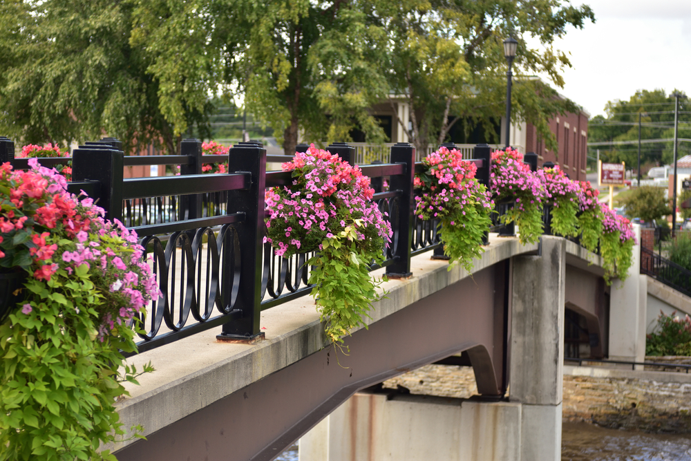 a flower-lined bridge in Northfield, Minnesota