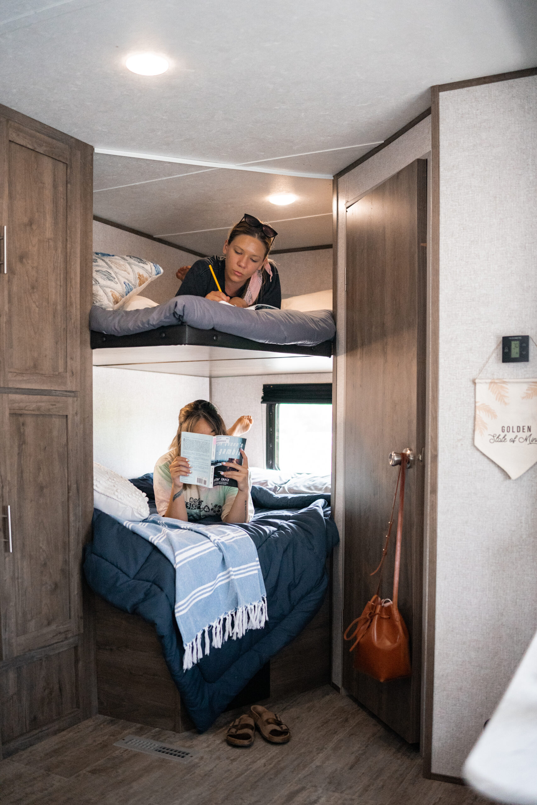 two women in RV bunk beds