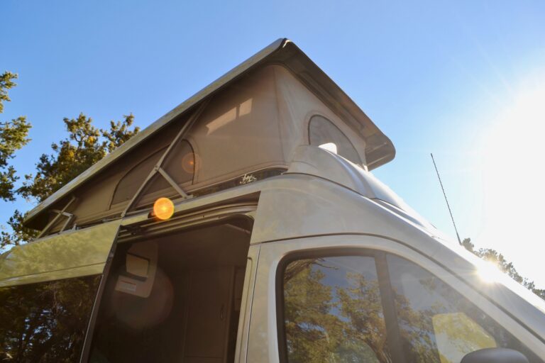 a Class B camper with a pop-up roof